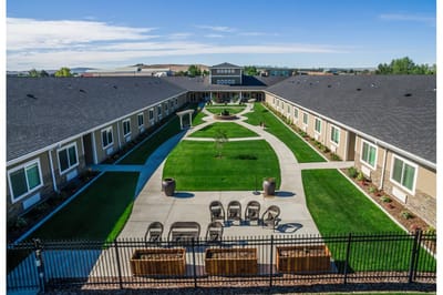 Aerial view of a landscaped outdoor space with seating