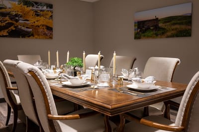 Stylish dining room setup with elegant tableware