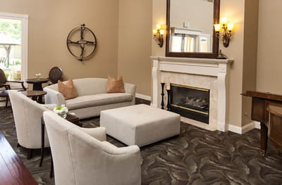 Interior common area with seating and fireplace
