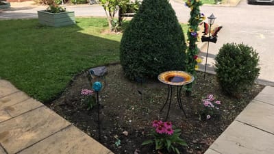 Well-kept garden area with decorative features