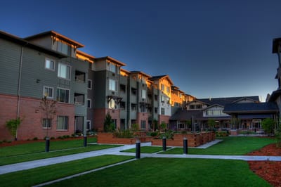 Building exterior with landscaped gardens