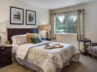 Cozy private resident bedroom with decor and natural light