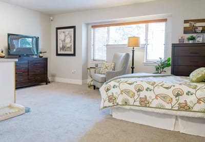Cozy resident room with a bed and television