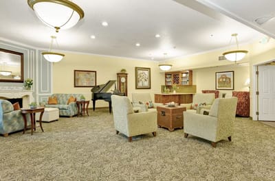 Interior lounge area with seating and a piano