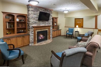 Cozy common area with seating and fireplace