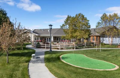 Outdoor view of the assisted living facility with green space