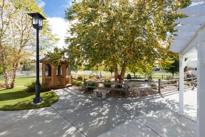 Outdoor courtyard with gazebo and landscaping