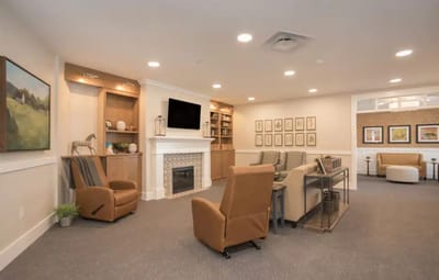 Common area with seating and a fireplace