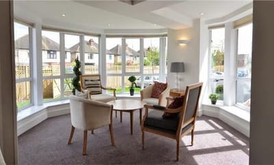 Bright communal area with seating and natural light