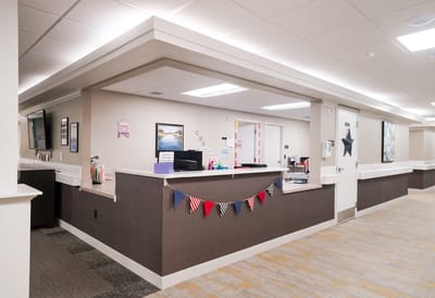 Interior view of a facility's reception area with decorations