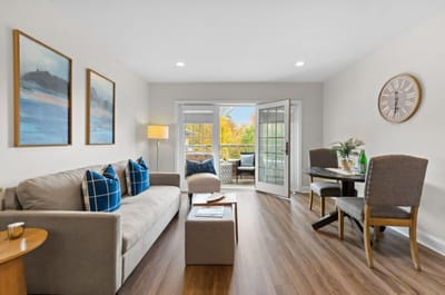 Bright interior common area with seating and natural light