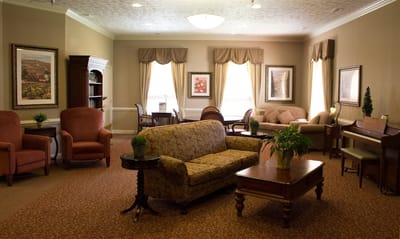 Common area with seating and decorative artwork