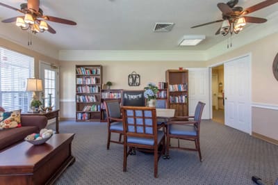 Common area with bookshelves and seating