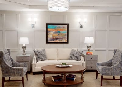 Cozy common area with a couch and artwork