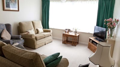 Cozy common area with seating and window view