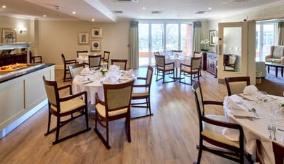 Elegant dining area set for a meal