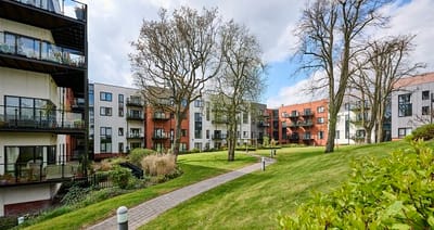 Outdoor view of residential buildings and landscaped garden