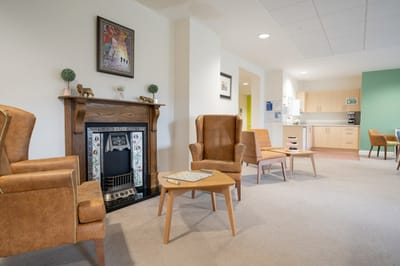 Bright common area with comfortable seating and decor