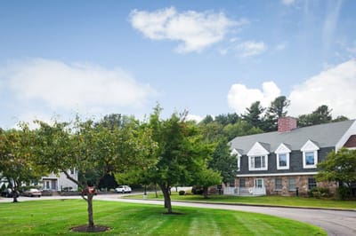 Exterior view of Huntington Common with green landscaping