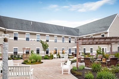A serene outdoor space with seating and garden areas