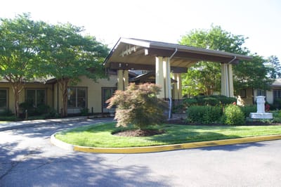 Exterior view of Sunrise at Bon Air entrance with landscaping