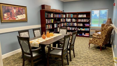 Interior of a common area with bookshelves and seating