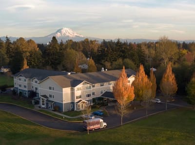 Aerial view of King's Manor Senior Living Community with autumn trees