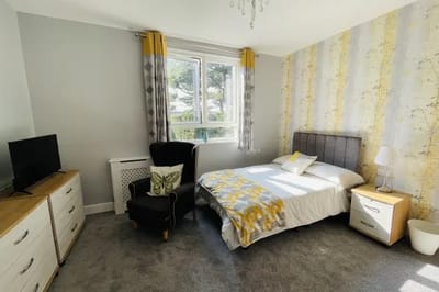 Cozy private resident room with comfortable furnishings