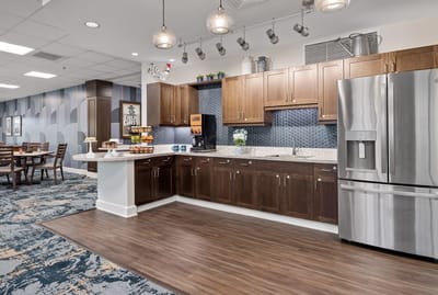 Interior kitchen space with cabinets and seating