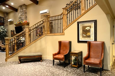 Interior seating area with decorative staircase