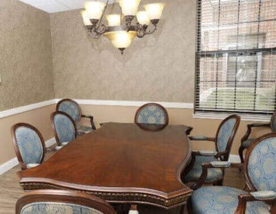 Elegant dining room with a wooden table and chairs