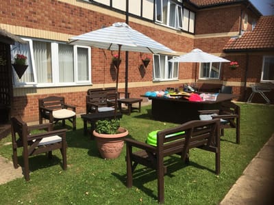 Outdoor seating area with umbrellas and tables