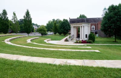 Exterior view of the facility with well-maintained gardens