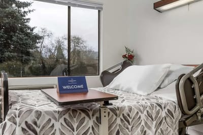 A well-prepared resident room with a welcome sign