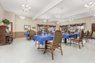 Dining area with tables set for a meal