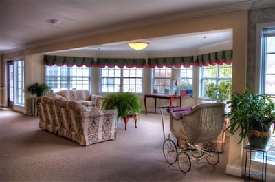 Bright lobby area with comfortable seating and plants