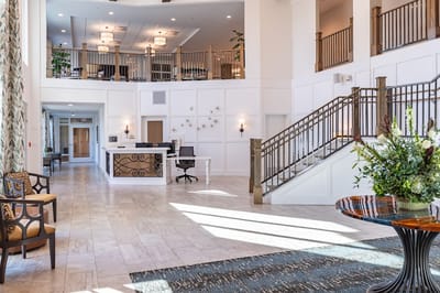 Bright and inviting lobby area with seating and decor