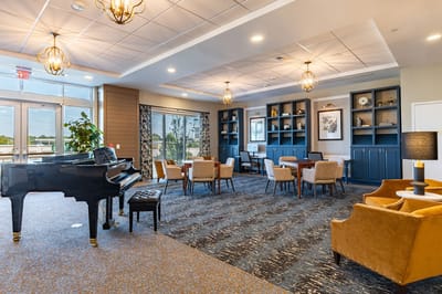 Interior common area with seating and piano
