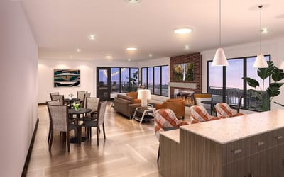 Bright common area with seating and large windows