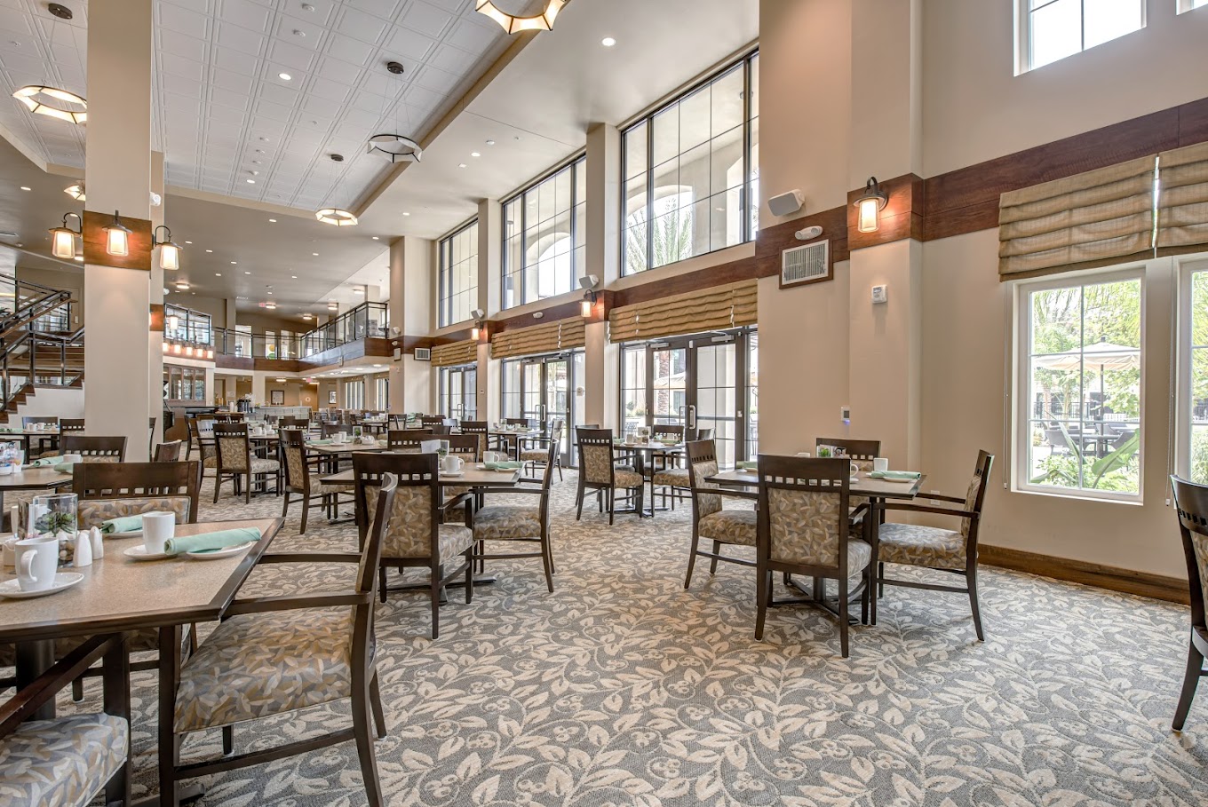 Bright dining area with tables and chairs