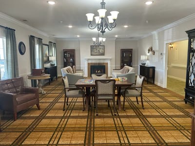 Cozy common area with seating and a fireplace