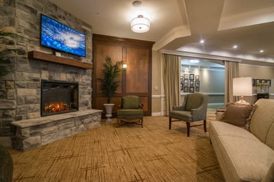 Cozy common area with a fireplace and seating