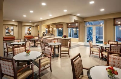 Bright dining room with tables and chairs
