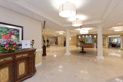 Bright lobby area with flowers and elegant decor