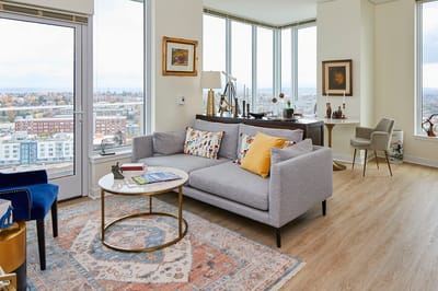 Bright and modern interior living space with city view