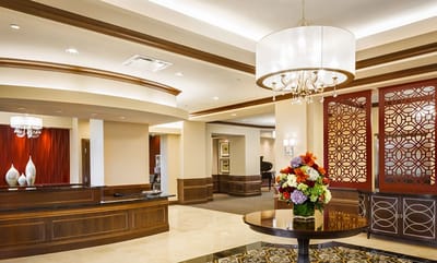 Interior view of a welcoming lobby with a reception desk