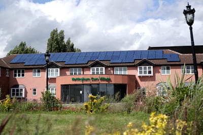Exterior view of Nottingham Care Village with solar panels