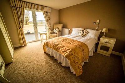 A private room with a bed and window