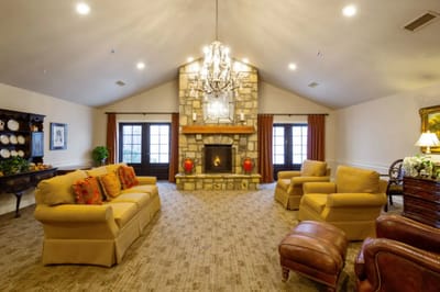 Cozy common area with seating and fireplace