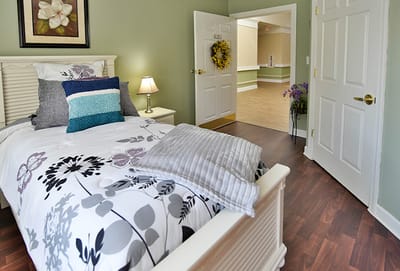 Cozy private room with bed and decor